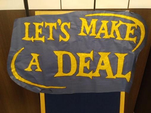 Game show-style sign for Let's Make a Deal