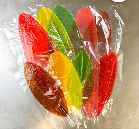 brightly colored candy that looks like flat suckers